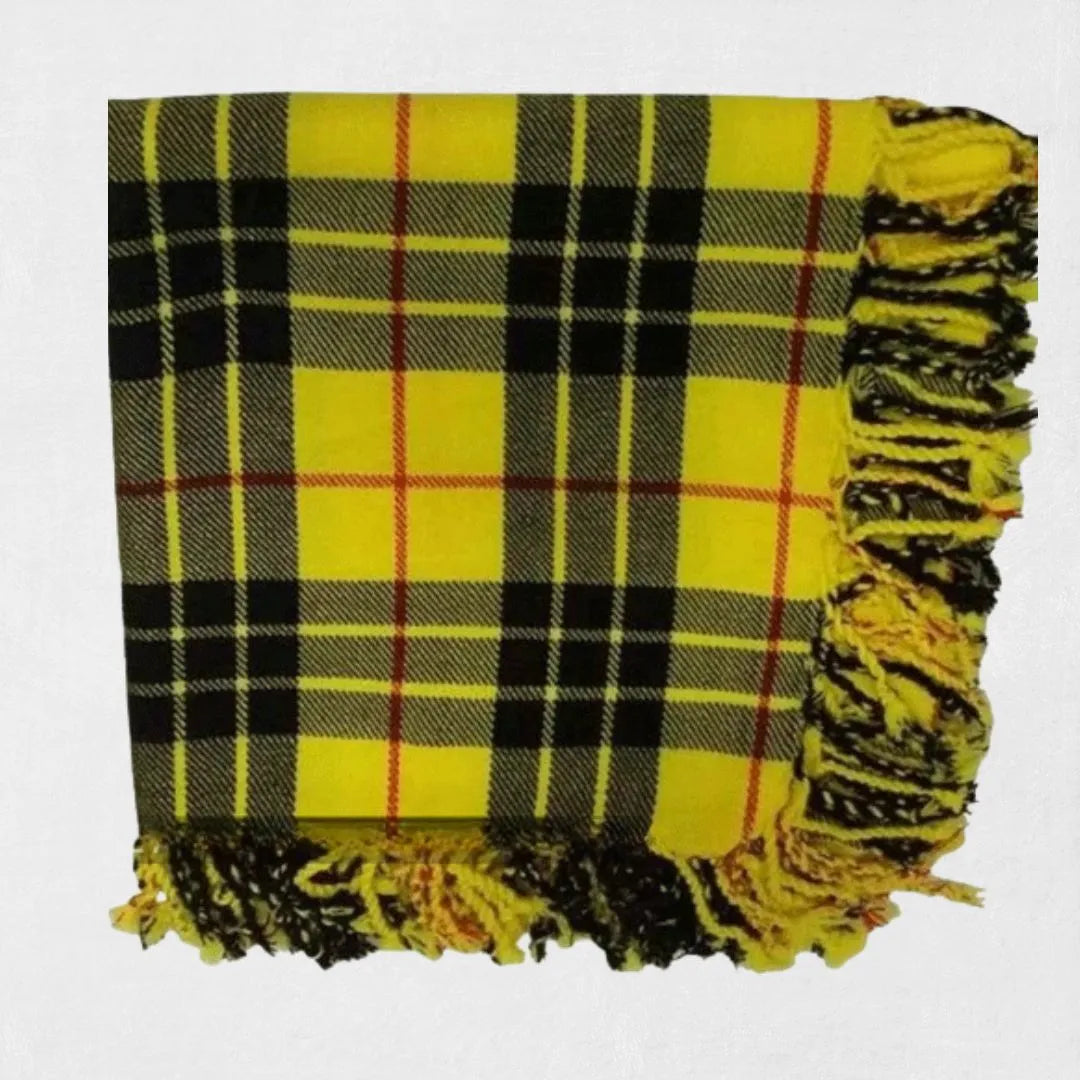 Macleod of Lewis tartan fly plaid in yellow and black worn with formal Scottish kilt outfit