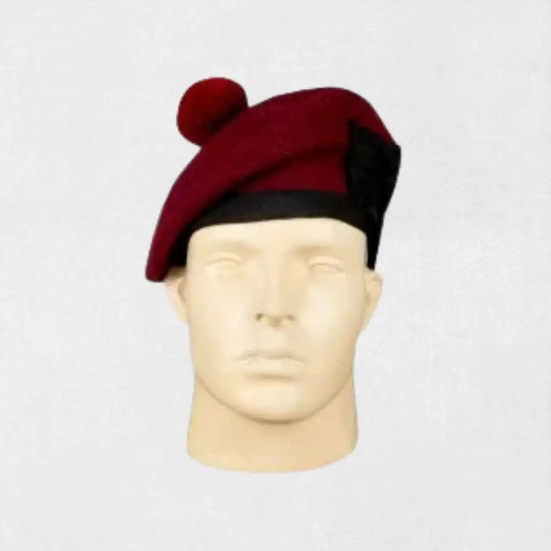 Maroon Balmoral hat with black ribbon and pom for Highland dress