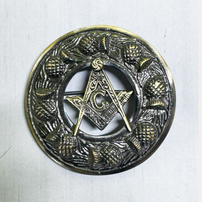 Antique brass Masonic brooch featuring square and compass Freemason symbols