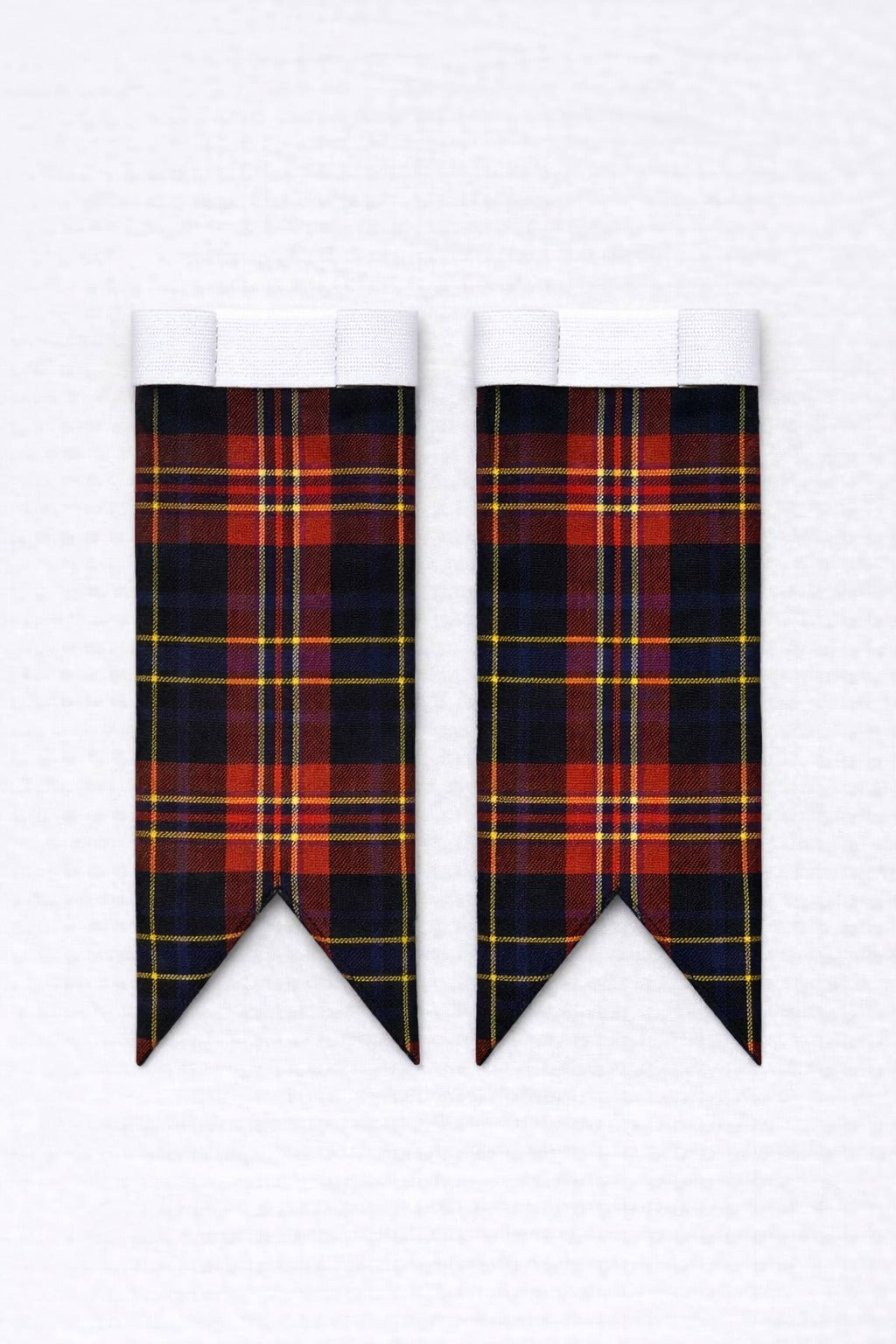 Black Stewart tartan flashes worn with traditional Scottish kilt hose for Highland dress
