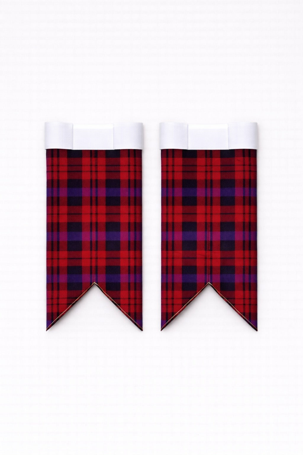 Handmade brown tartan kilt with traditional pleats and leather straps
