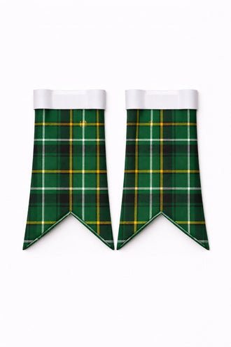 Handmade Celt tartan kilt in green, navy, and red overcheck pattern
