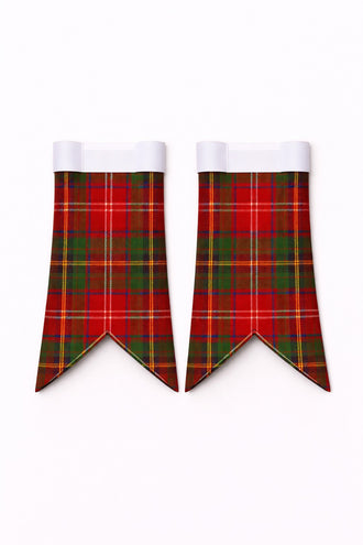 Handmade Chisholm tartan kilt in green, navy, and red overcheck pattern
