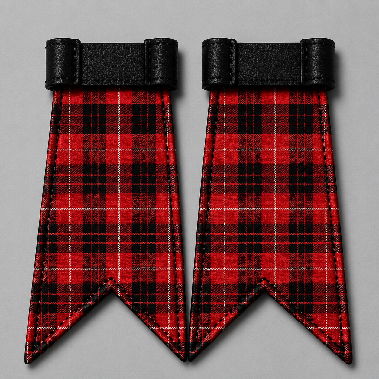 Clan Munro black and red tartan flashes attached to kilt hose for traditional Scottish Highland dress