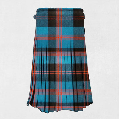 Plaid kilt with blue, black, and red colors on a white background