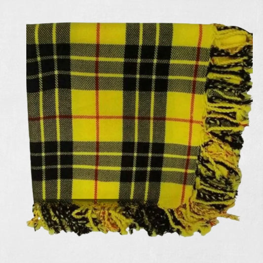 Macleod of Lewis tartan fly plaid in yellow and black worn with formal Scottish kilt outfit