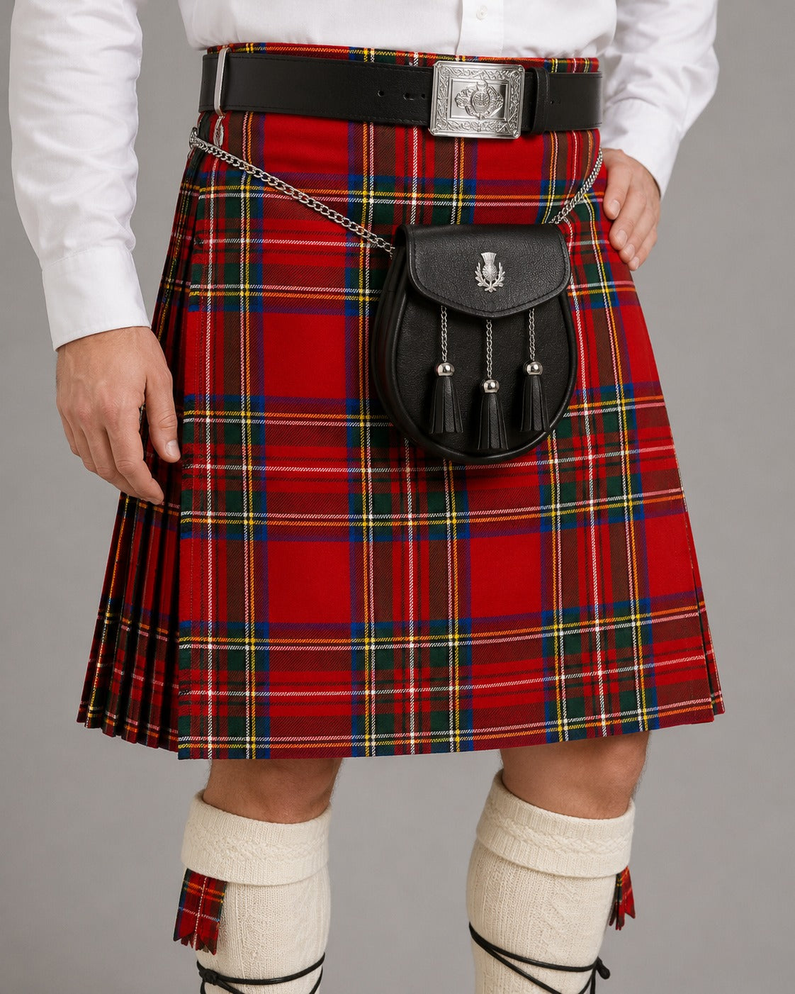 Modern Stewart tartan kilt for men featuring traditional pleats and adjustable leather straps