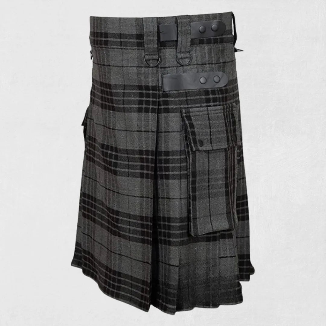 Plaid kilt with leather straps on light gray background, featuring Kiltsstore logo.