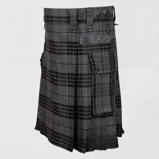 Plaid kilt with leather straps on light gray background, featuring Kiltsstore logo.