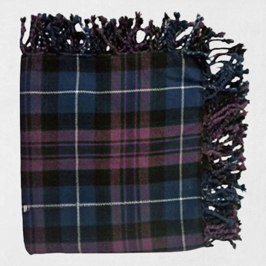 Pride of Scotland tartan fly plaid in purple and navy worn over shoulder with Highland outfit