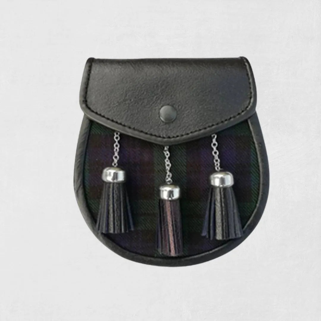Black leather sporran with silver tassels on light gray background.