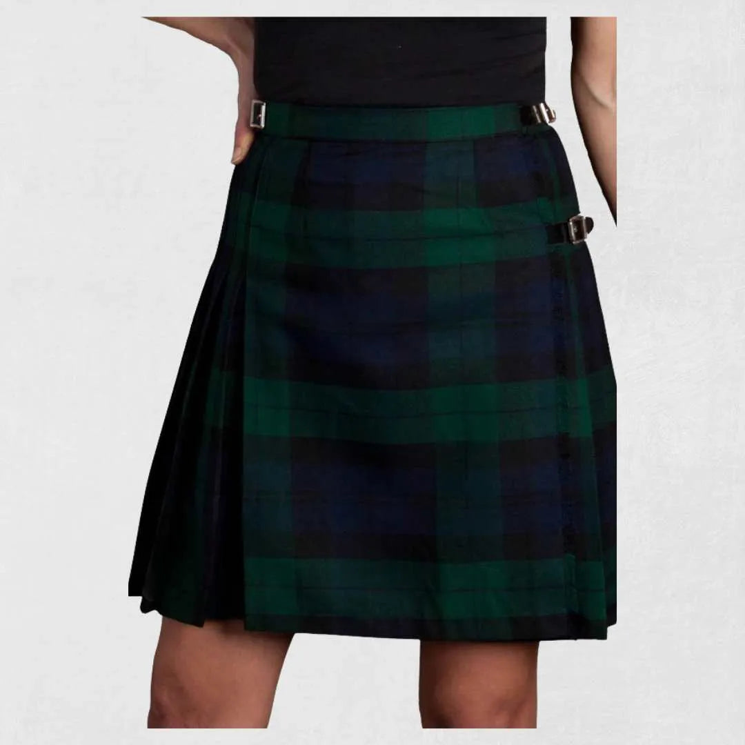 Black Watch tartan kilt in green, navy, and black with leather straps
