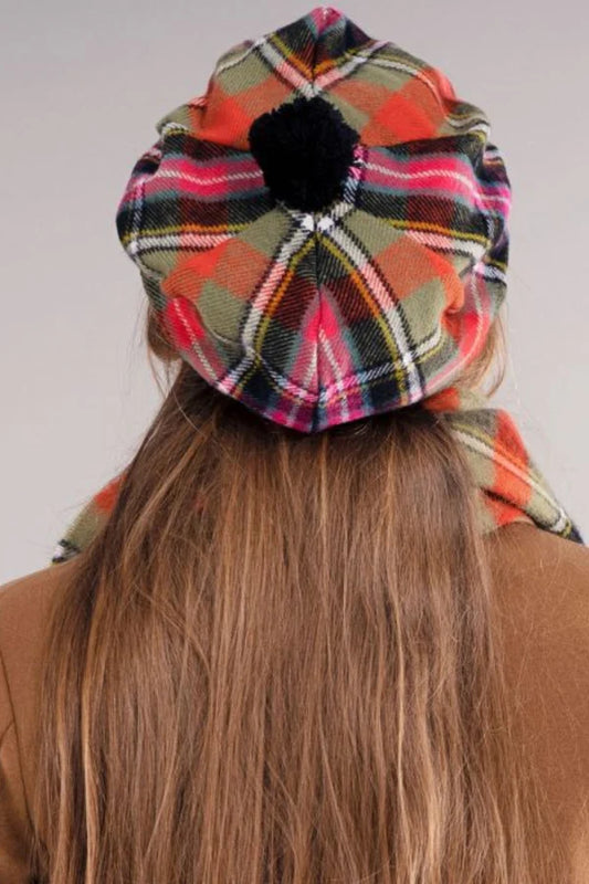 Scottish tartan Tam O’ Shanter hat with traditional plaid pattern
