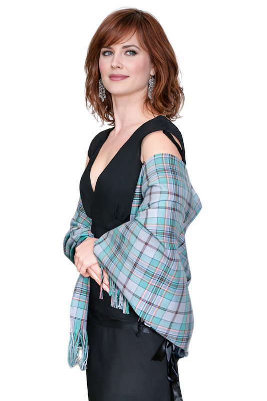 Scottish tartan stole draped as a plaid wrap shawl for formal wear
