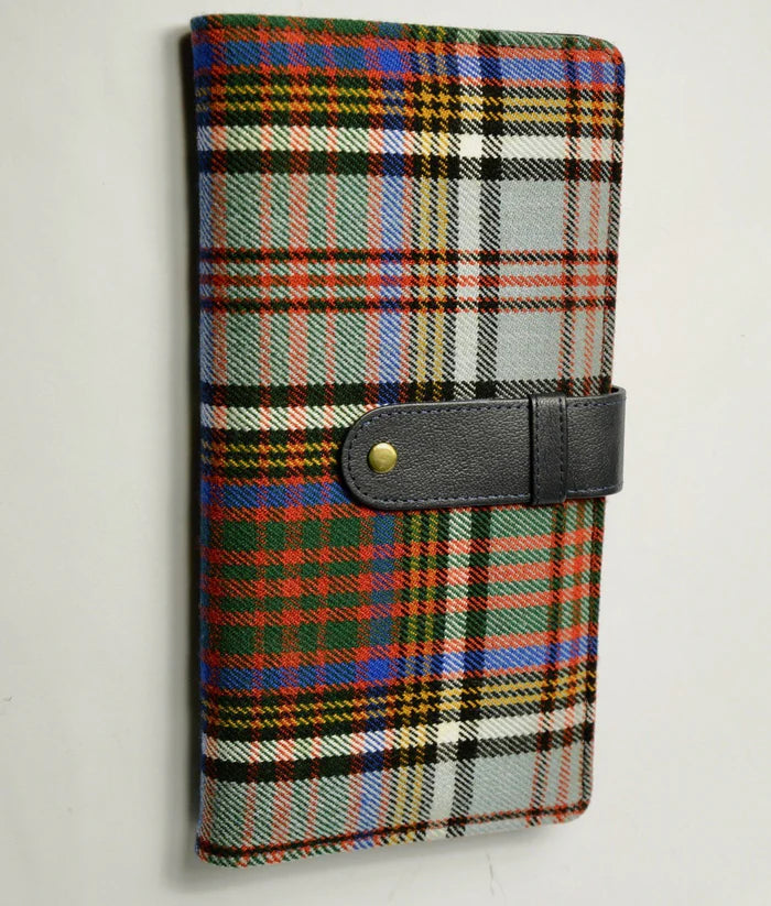 Scottish tartan travel wallet with multiple compartments and secure closure
